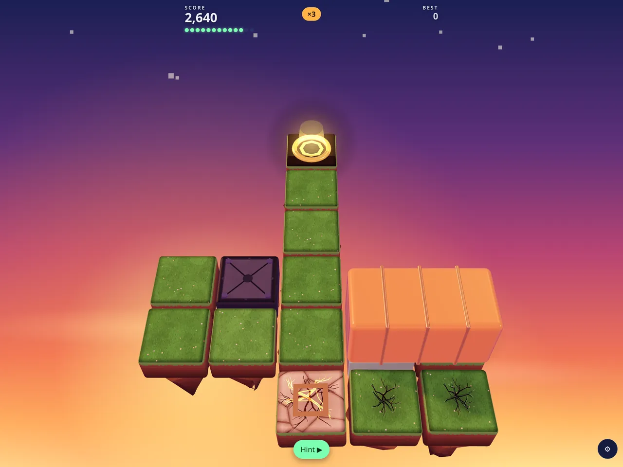 An island at sunset: cracked tiles and a path of grass tiles up to the glowing exit.